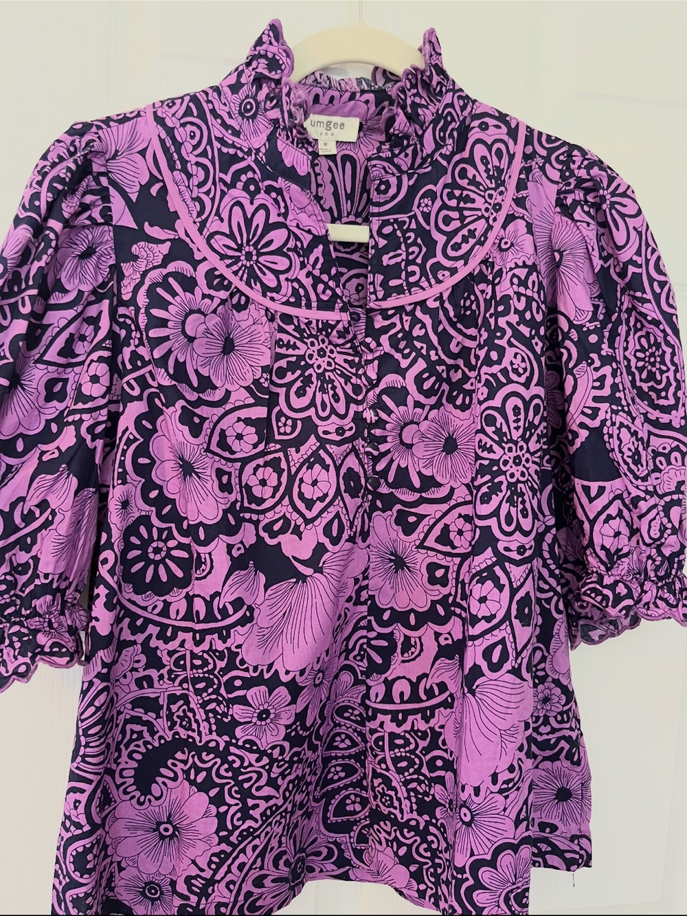 Umgee Cotton Short Sleeve Ruffle Neck Puff Sleeve Top
Medium